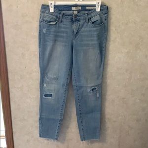 Distressed light wash jeans